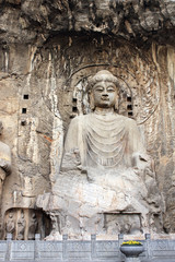 Fototapeta na wymiar Longmen Grottoes with Buddha's statue