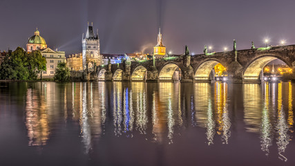Fototapeta na wymiar Charles bridge in Prague at night, Czech Republic. Hdr image.