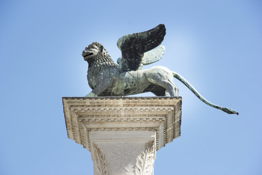 Winged St Mark Lion Venice symbol on its column. Italy