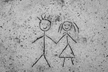 couple sketching on sand background