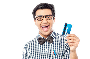 Laughing guy holding credit card