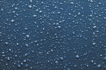 Raindrops on blue background