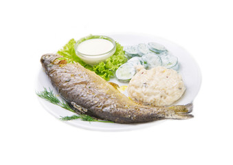 The trout fish and potatoes served in the restaurant