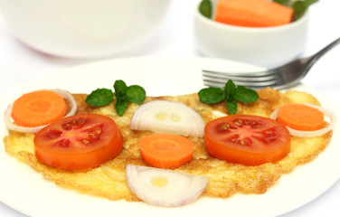 Closeup of fried egg with salad