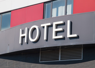 Hotel word in the facade of a Hotel