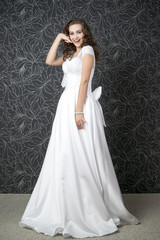 Fototapeta premium Beautiful woman in white wedding dress