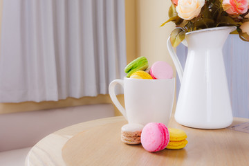 traditional french colorful sweet Macaron in cup