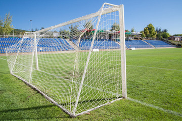 Naklejka premium Net soccer goal football green grass