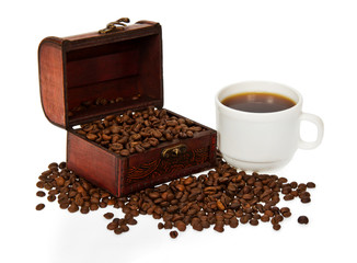 Chest with grains, a cup about the coffee