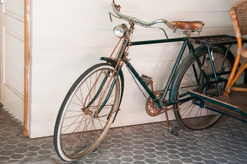 Naklejka na ściany i meble Old bicycle on the street