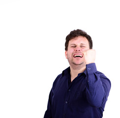 Portrait of smiling chubby man with fists up isolated on white