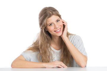 Beautiful Woman Leaning On Table