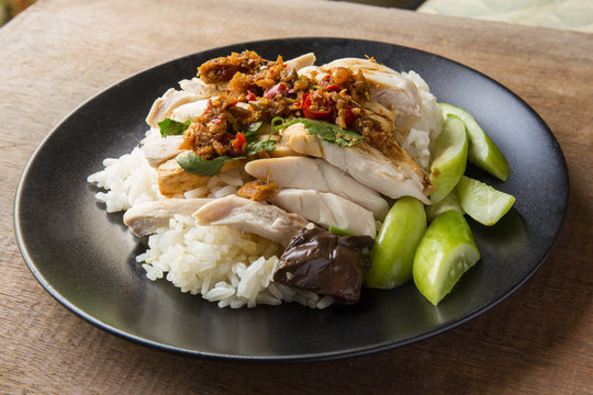 boned, sliced Hainan-style chicken with marinated rice