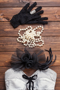 retro dress and accessories on wooden background