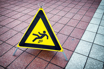 caution slippery surface sign