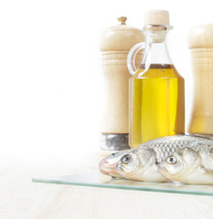 Fresh fish with spices and oil.