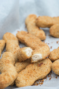 Hot cooked chicken goujon in breadcrumbs for lunch