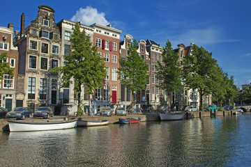 Fototapeta premium Houses along the canals in Amsterdam