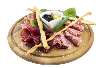plate of sausages and bacon sauce on a table in a restaurant