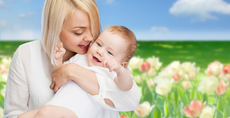 happy mother with smiling baby