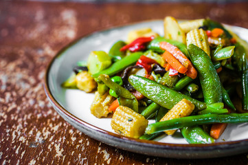 Baked vegetables on rustic background