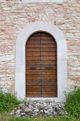 Fototapeta na wymiar An image of an old door in Altino, Ascoli Piceno - Italy