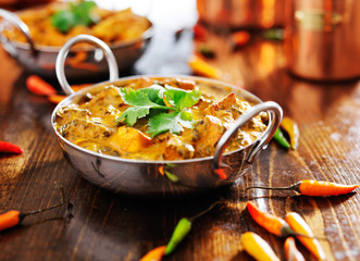 saag paneer curry dish with cilantro garnish