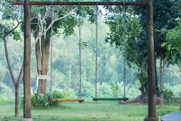 Empty swings on playground
