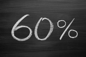 60-percent header written with a chalk on the blackboard