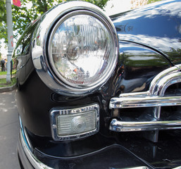 GAZ-12 ZIM car headlight on show of collection Retrofest cars
