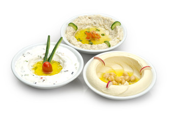 Arabic traditional Hummus , labneh and mtabbal isolated