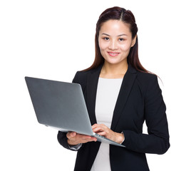 Asian business woman use portable computer