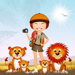 girl photographing lions