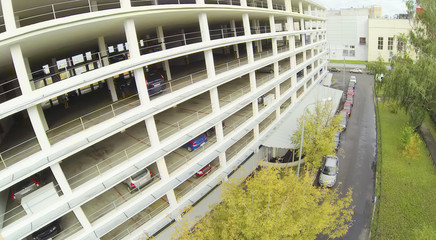 Cars parked in multistoried parking.