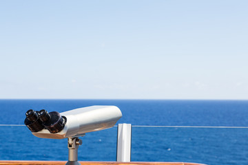 Silver Scope Overlooking Blue Sea