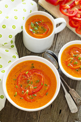 Roasted red pepper soup in white bowl
