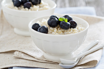 Rice pudding with syrup and berries