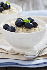 Rice pudding with syrup and berries