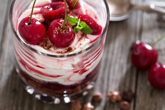 Sweet cherry cheesecake in a glass