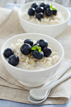 Rice pudding with syrup and berries