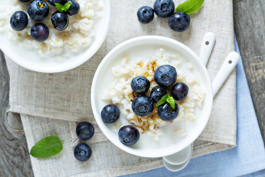Rice pudding with syrup and berries