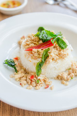 Spicy fried chicken with basil and rice