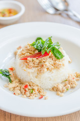 Spicy fried chicken with basil and rice