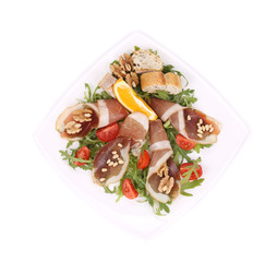 Salad with arugula and prosciutto.