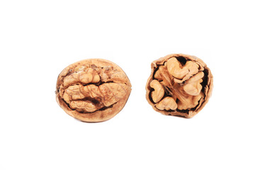 Closeup of cracked walnuts.