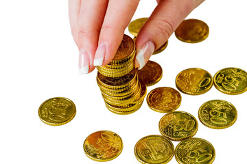 Frau mit Münzstapel beim Geld sparen