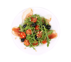 Salad with arugula and prosciutto.