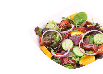 Fresh salad with sausage.