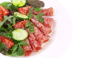 Fresh salad with salami.