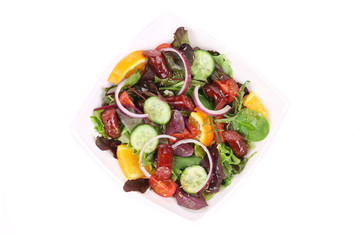 Fresh salad with sausage.